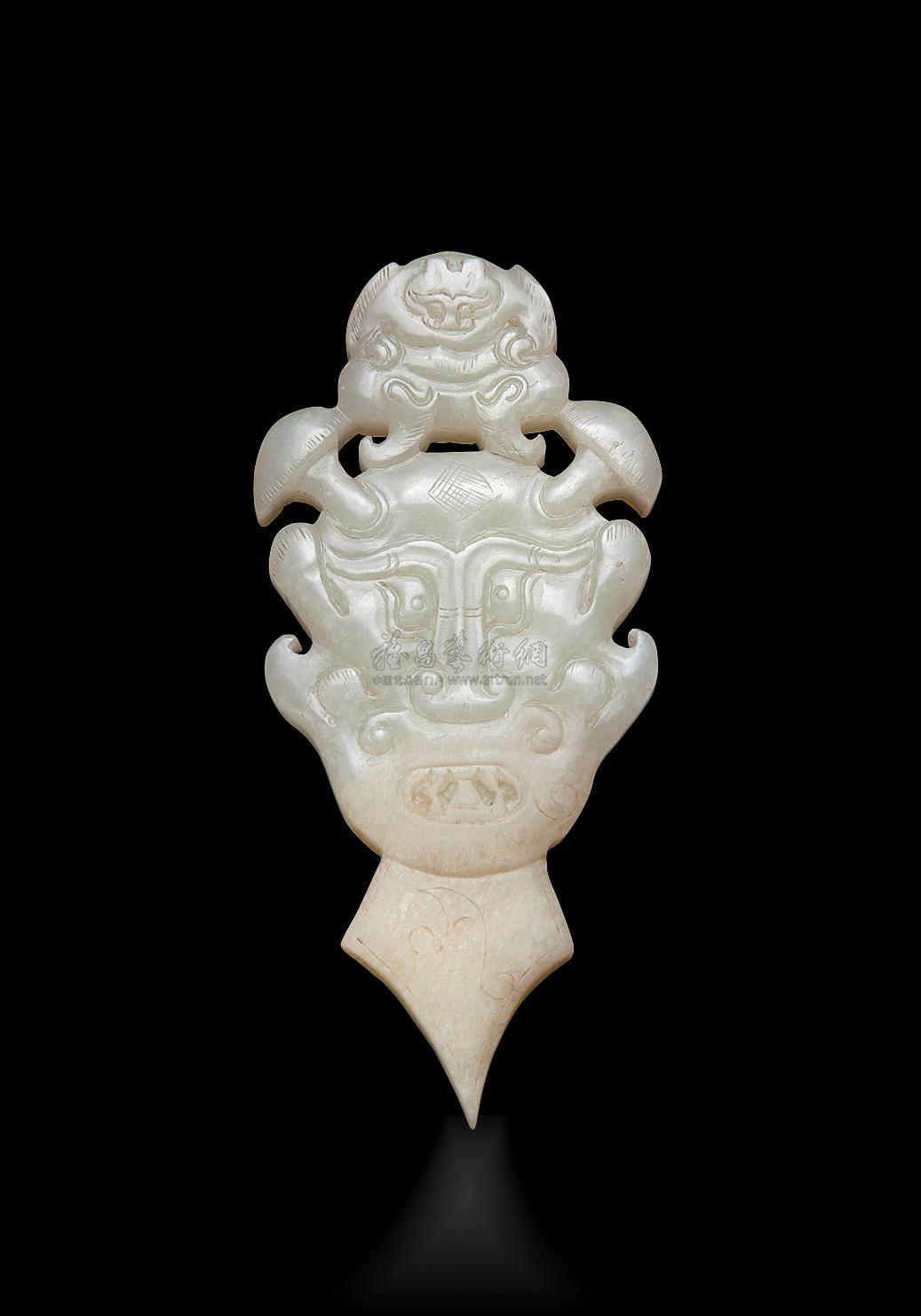1041汉代白玉饕餮纹圭